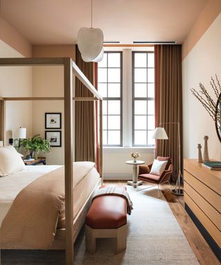 colors that go with brown, bedroom with light brown curtains and furniture, ochre ceiling and accessories, four poster bed, cream walls, artwork